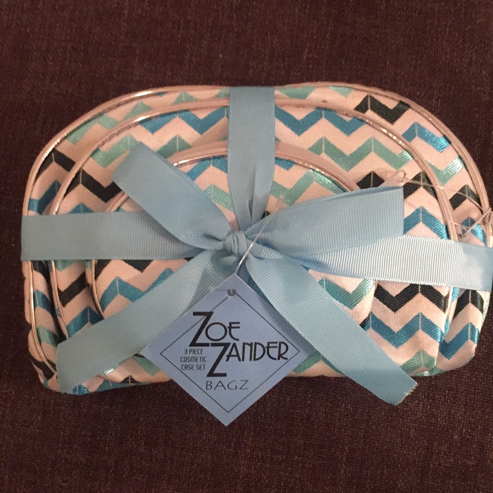 COPY - NWT! 3 piece cosmetic case set!